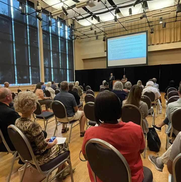 Patrons at an Interpretive Plan Public Meeting Looking at Projector Screen