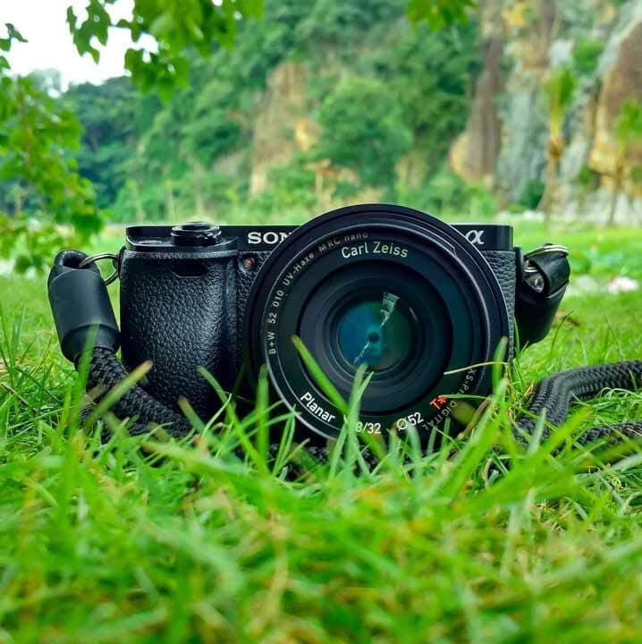 Camera Laying in Grass
